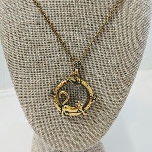 Gold cat and mouse magnifying glass locket